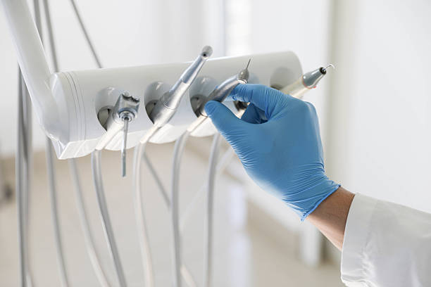 Professional Tooth Extraction technician working in Romulus, MI